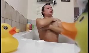 Hidden Spy Camera catches a young naked boy shot at a bath and finger his ass